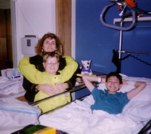 My mom, my brother and I at Shriners Hospital