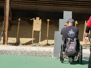 Jeff Messer shooting from behind cover