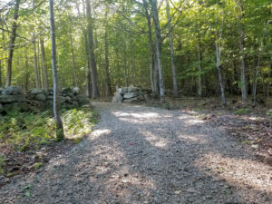 View of split in rock wall allowing trail to pass through